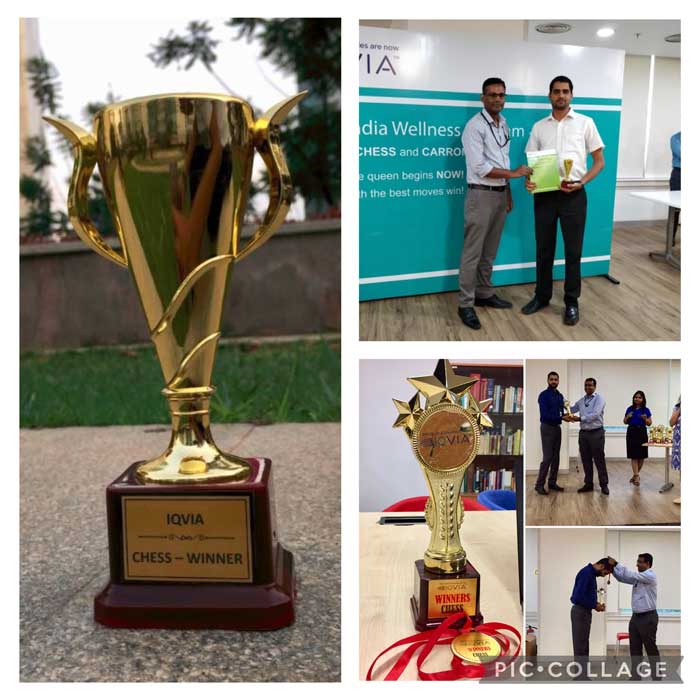 Chess coach with winning trophy